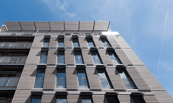 résidence CDC Habitat Girard à Montreuil (93) est un projet exemplaire à plusieurs égards : labellisé Passivhaus, il est l'un des plus hauts immeubles à ossature bois d'Europe (R+6) et un véritable modèle de sobriété, notamment énergétique.